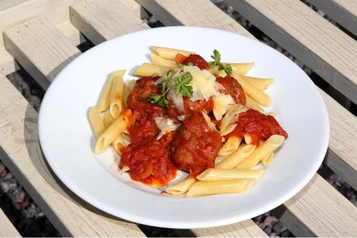 Penne with homemade meatballs in tomato sauce — cooked in Caroline's Kitchen