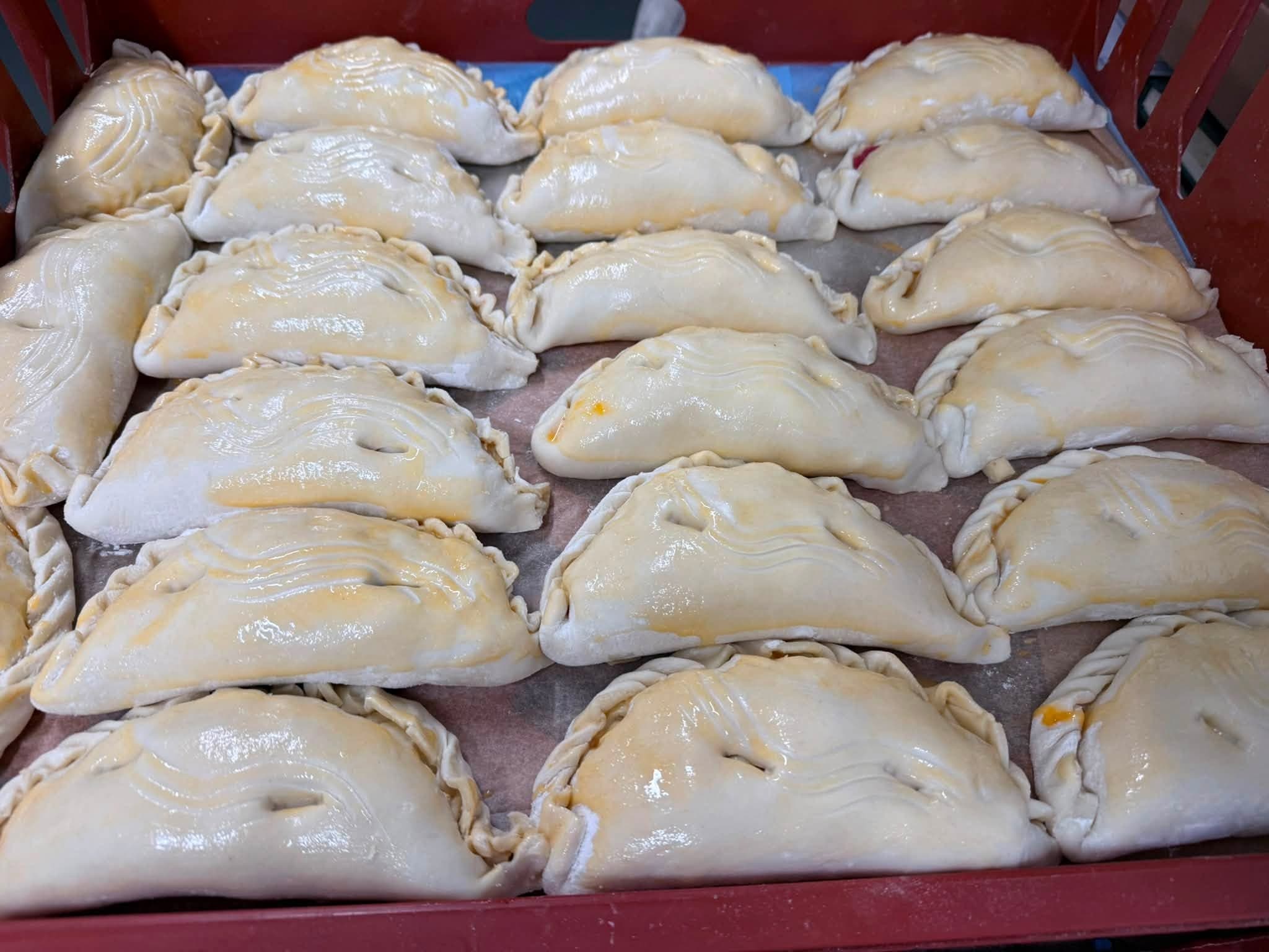 Hand-crimped pasties glazed and ready for the Churston oven