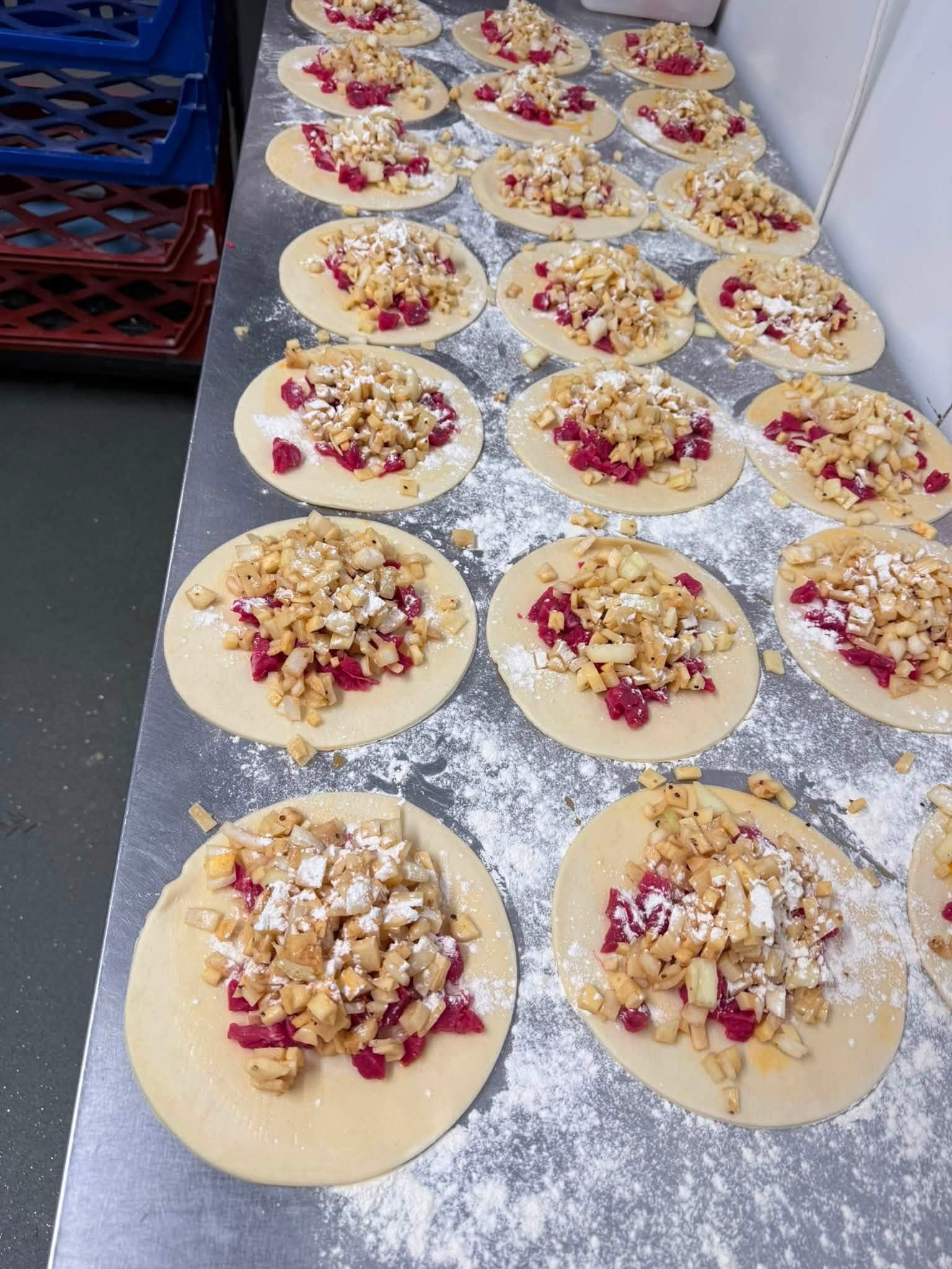 Beef, swede and onion piled onto pasty pastry, ready for crimping